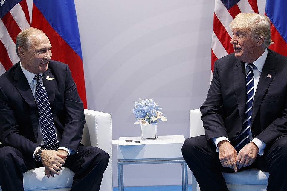 Президент России Владимир Путин и американский лидер Дональд Трамп