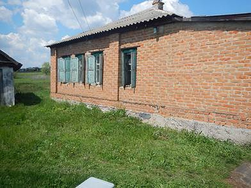 Дом, где произошло убийство.