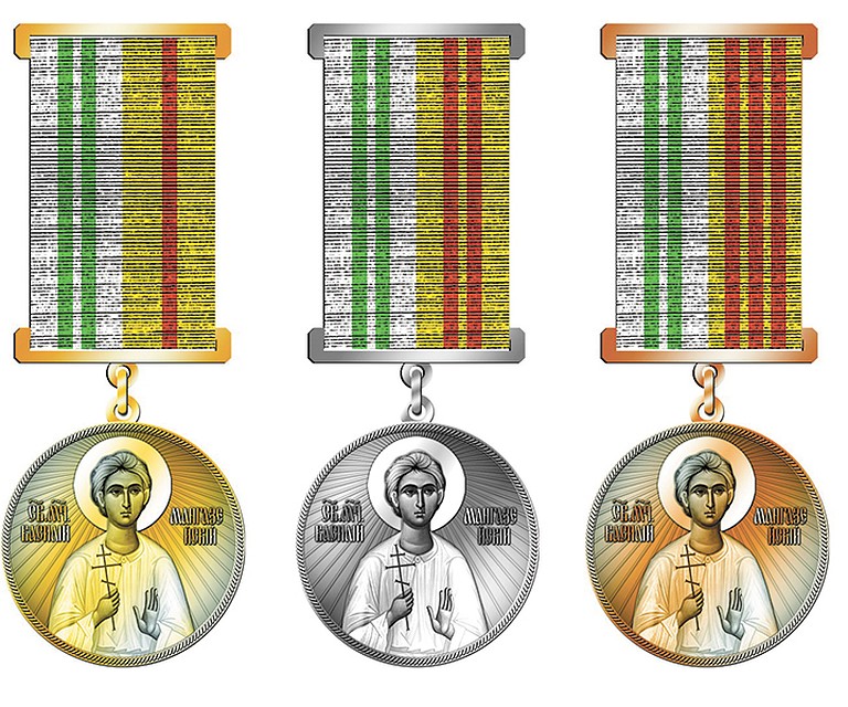 Медали имеют золотое и серебряное напыление.