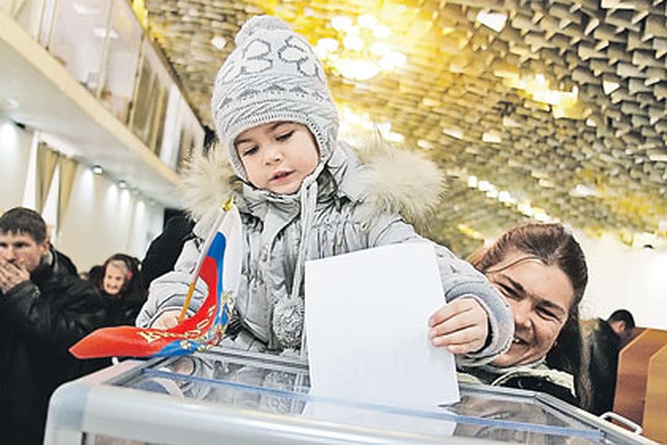 Многие россияне шли голосовать вместе с детьми. Ведь это выбор будущего.